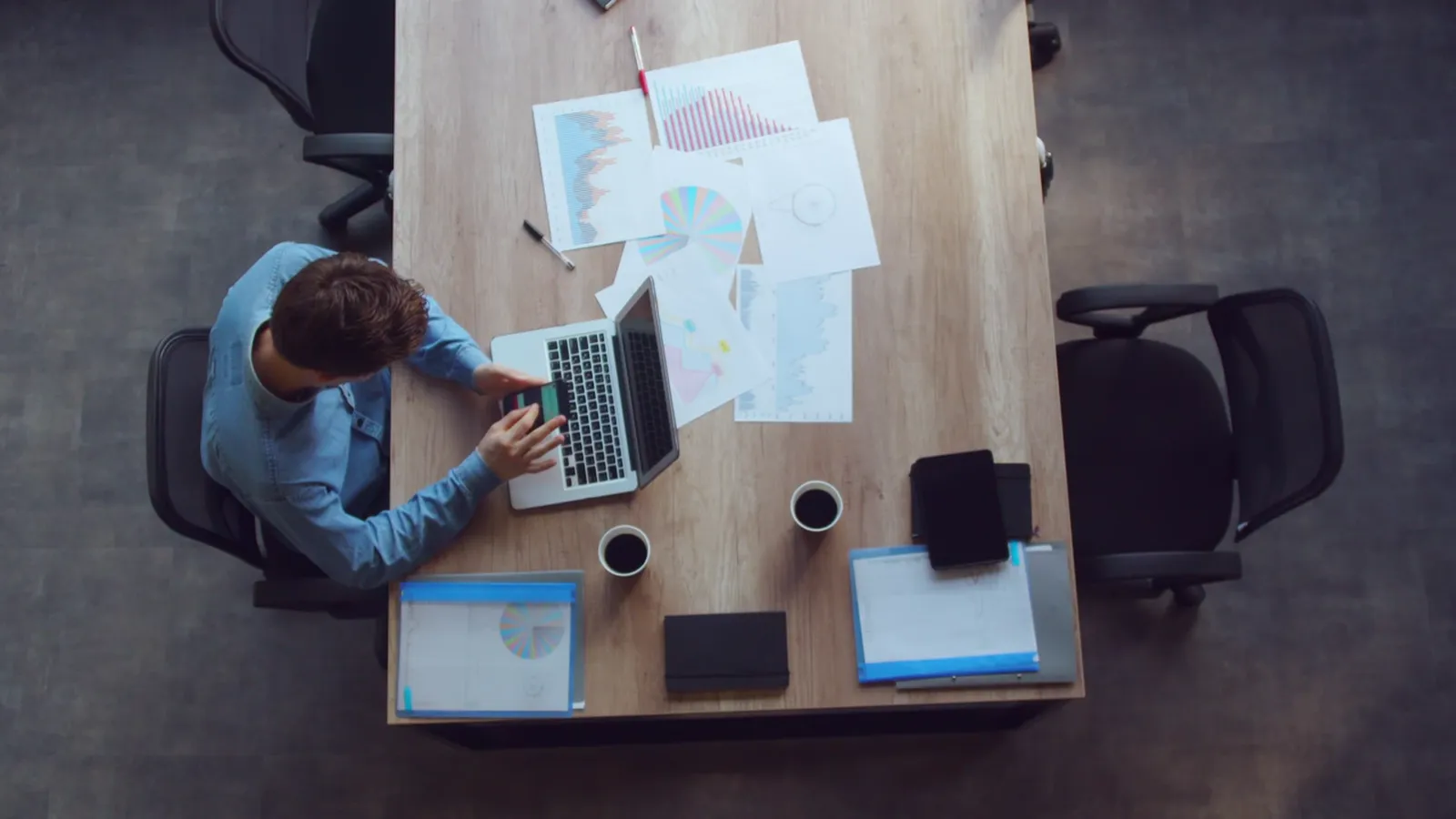 A small business owner working at a desk
