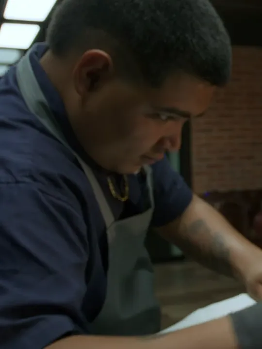 Luis, barber, shaping a beard